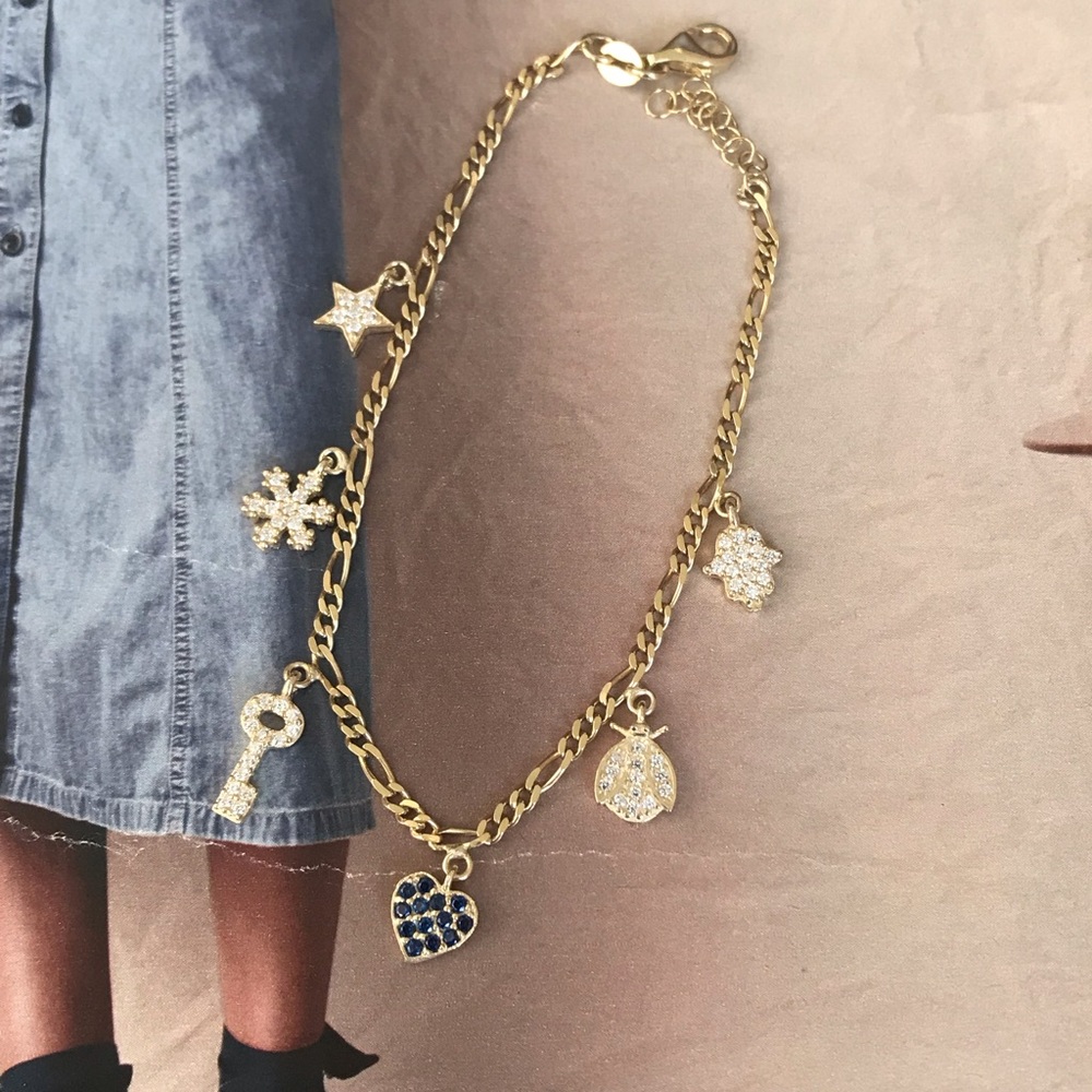 Gold charm bracelet - Picture 2 of 5